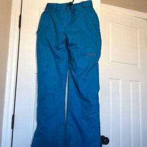Arctic women’s electric blue ski pants.